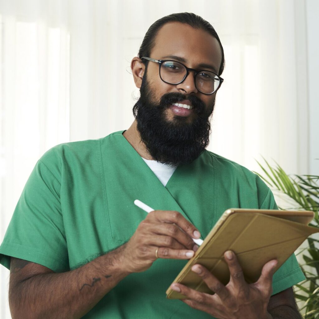 Nephrology provider reviewing patient notes